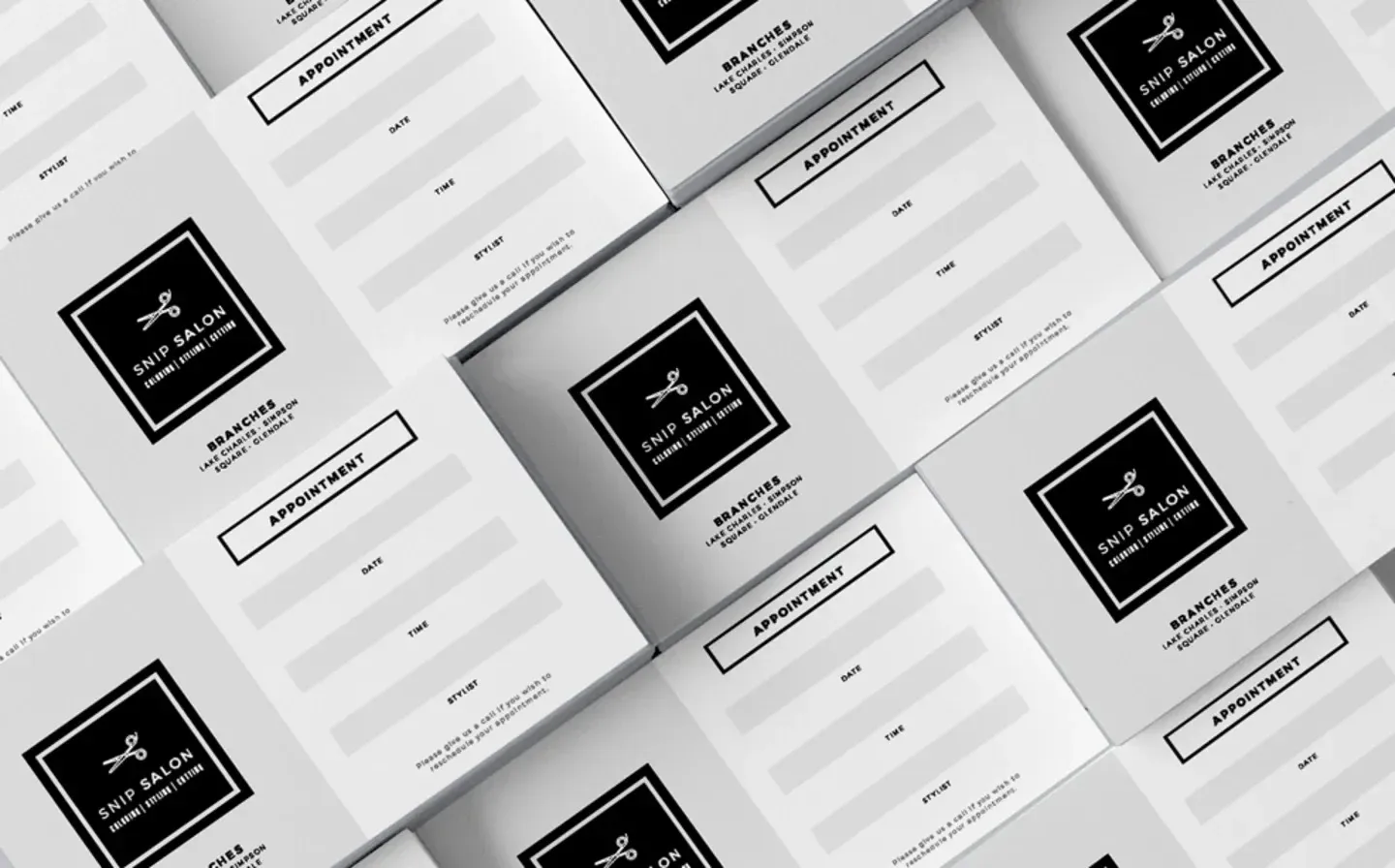 A collection of black and white appointment cards arranged neatly