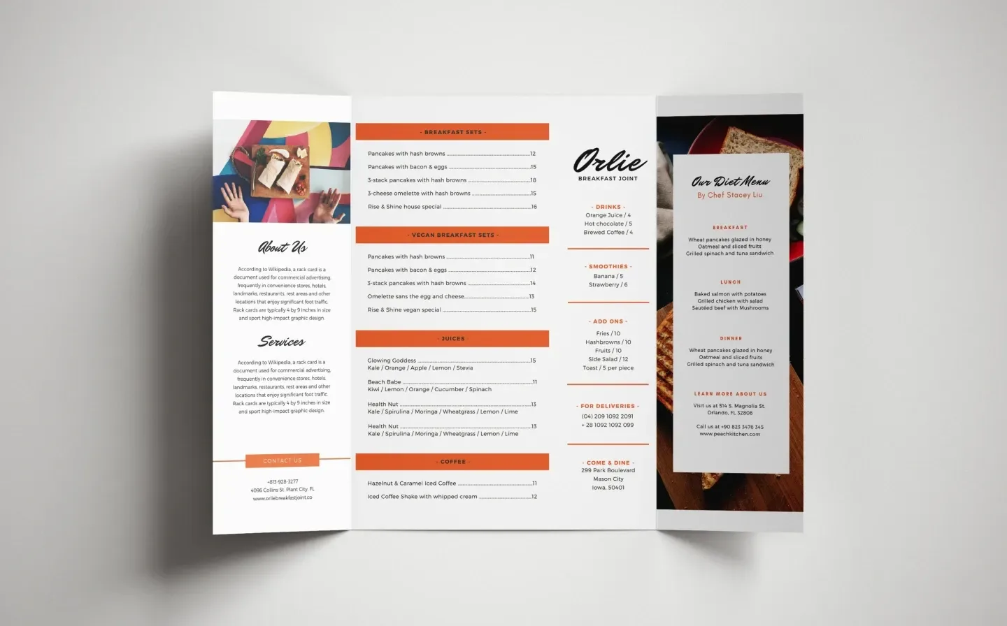 A folded menu for a restaurant featuring vibrant orange accents, designed for an inviting dining experience