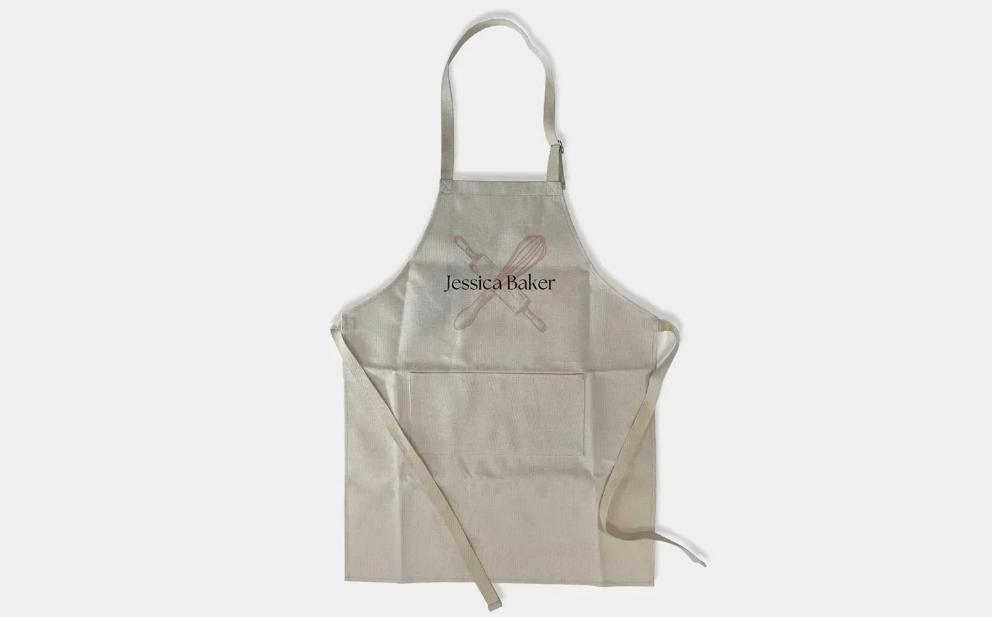 An apron adorned with a logo and the name 'jessica baker' in a striking font