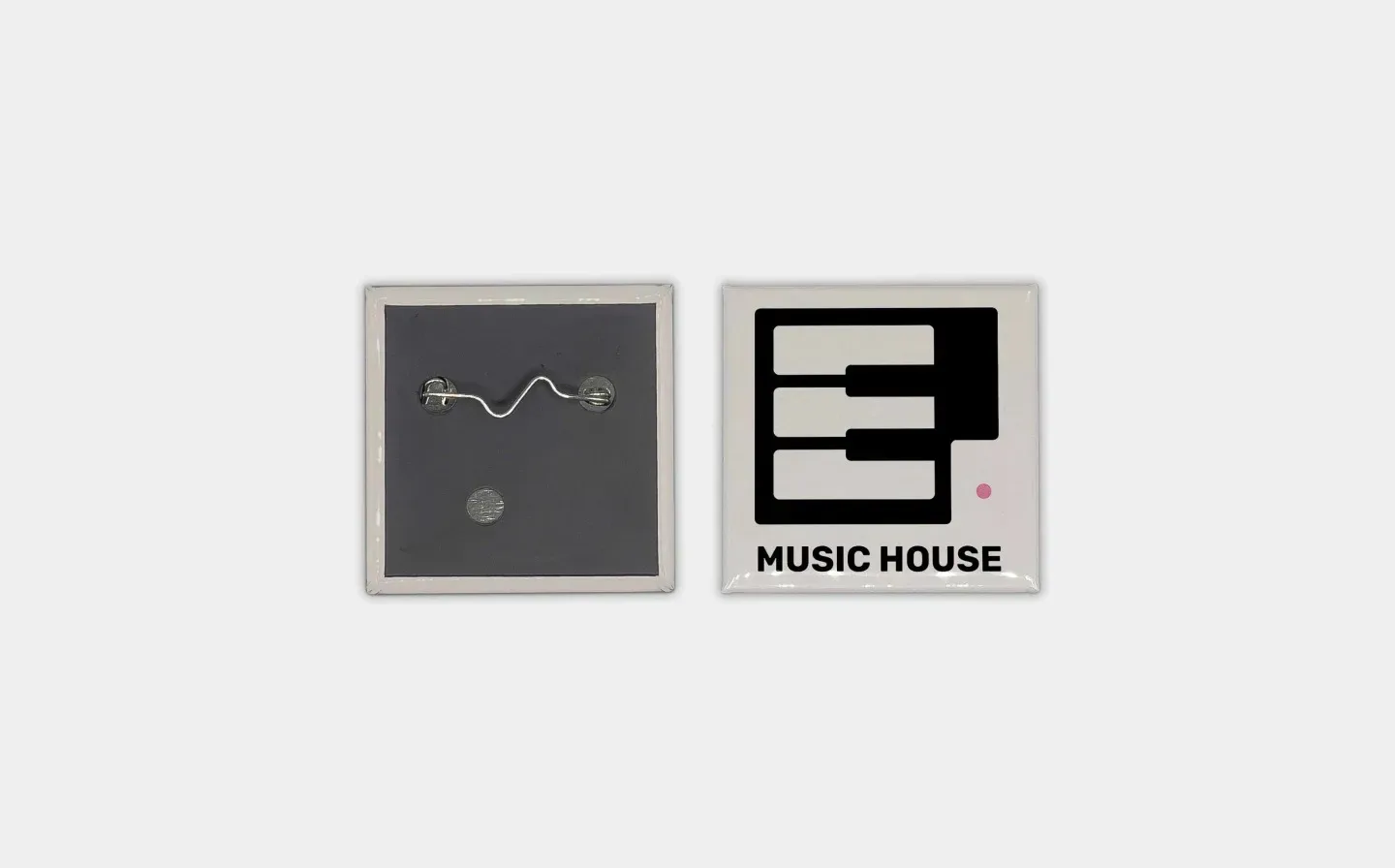 Two small square badges featuring the word "music house" prominently displayed 