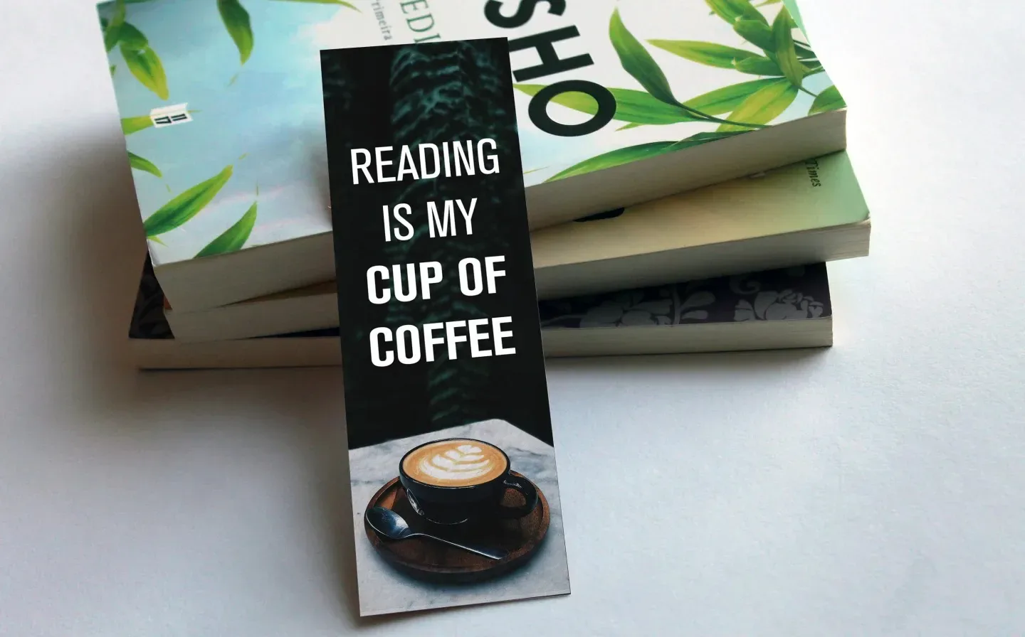 A bookmark featuring an illustration of a cup of coffee, perfect for book lovers and coffee lovers alike