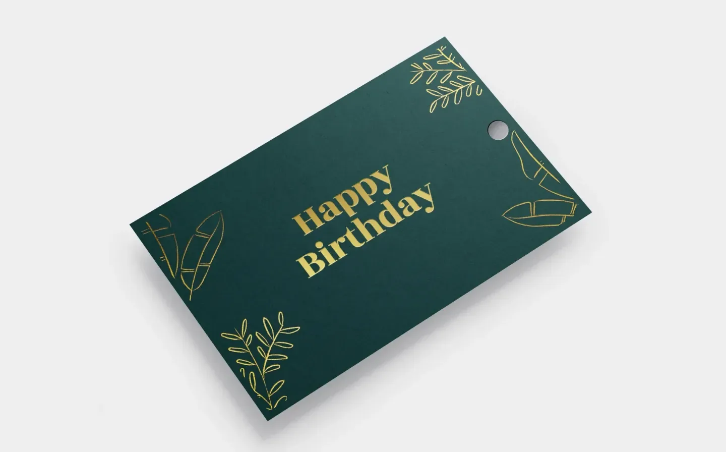 A green gift tag featuring a stylish "Happy Birthday" design on a plain background