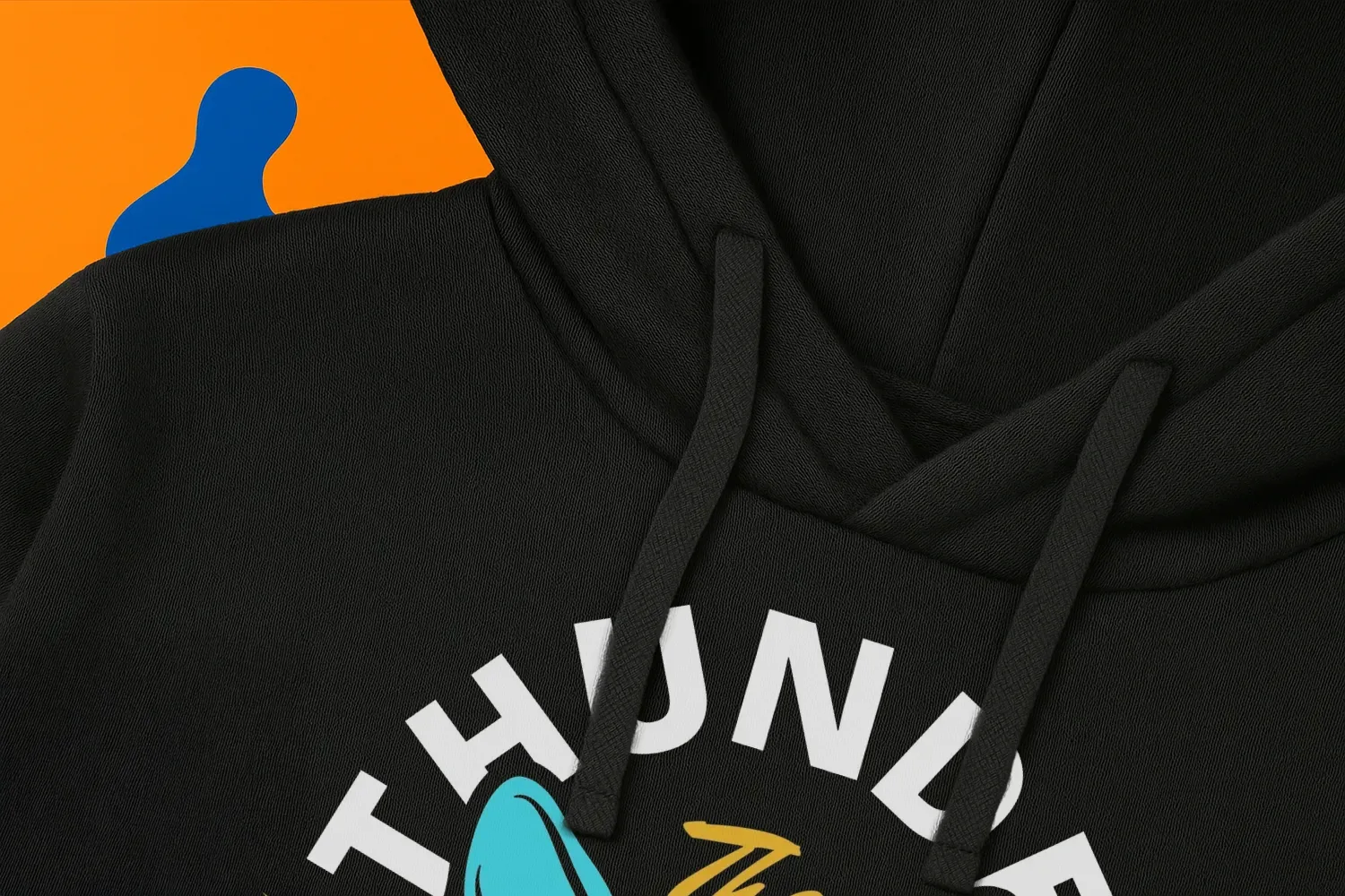 Black hoodie with "THUNDER" text and partial blue graphic on an orange and blue background.