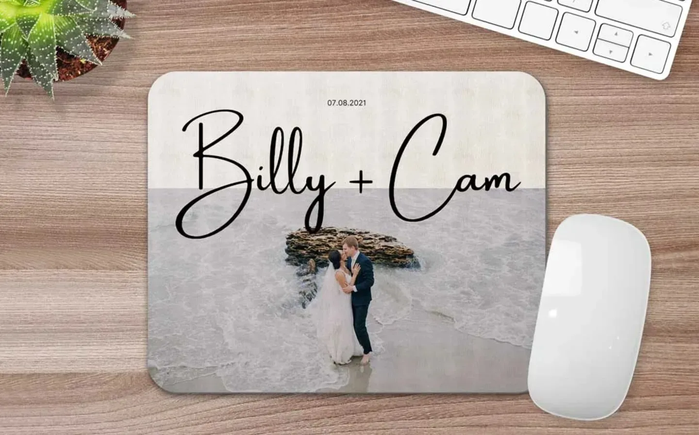 Personalised mouse mat featuring a wedding photograph displayed on a desk