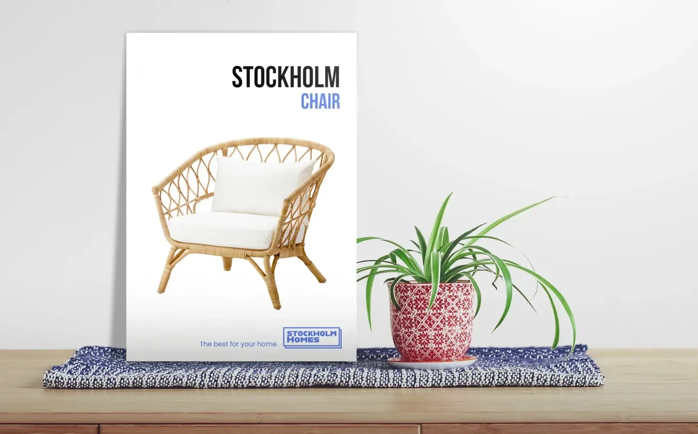 A strut card advertising a stylish Stockholm chair, displayed next to a plant on a table