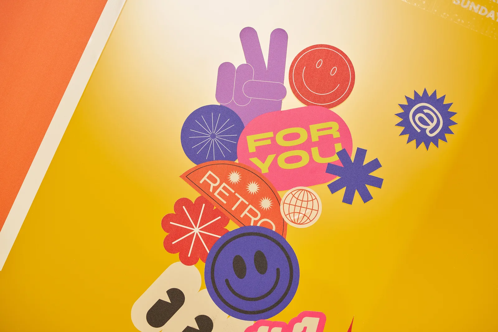 cluster of 12 small vinyl window stickers with text 'for you, retro' on a bright yellow background